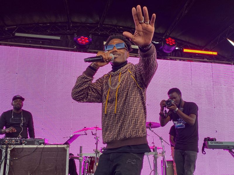 Kenyan rapper and activist Octopizz preforms during a concert promoting