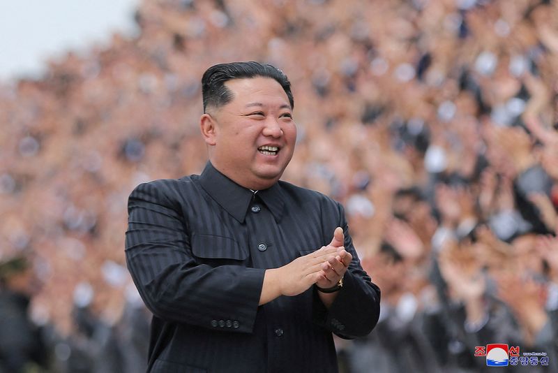 FILE PHOTO: North Korean leader Kim Jong Un applauds during