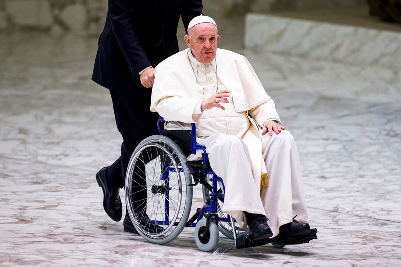 FILE PHOTO: Pope Francis meets with participants in the plenary