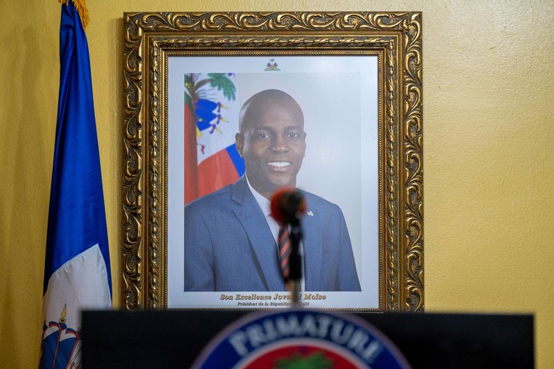 A picture of the late Haitian President Jovenel Moise hangs