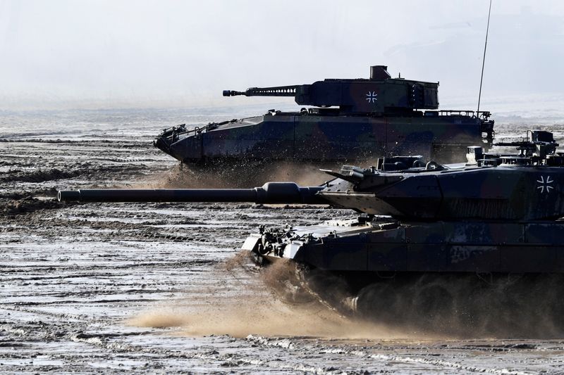 FILE PHOTO: A Leopard tank and a Puma tank are