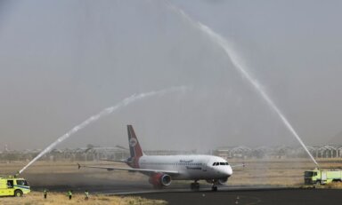 Yemen Airways plane is greeted with water canon salute at