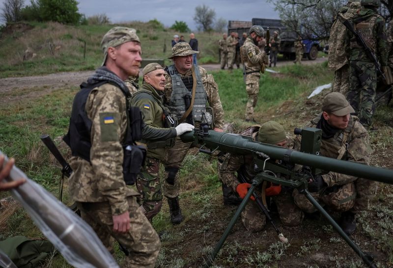 FILE PHOTO: Ukrainian servicemen of the Territorial Defence Forces take