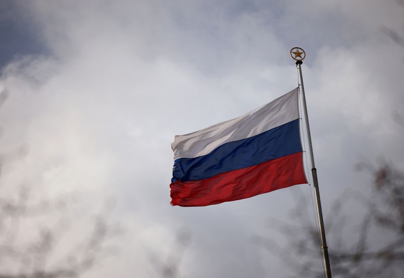 The national flag of Russia flies atop the Russian embassy