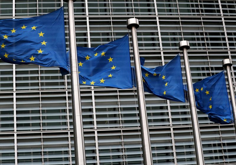 FILE PHOTO: EU flags fly outside the European Commission headquarters