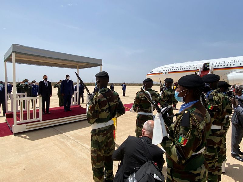 Senegal’s President Sall welcomes German Chancellor Scholz upon his arrival,