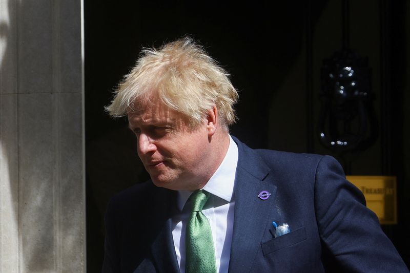 British PM Johnson leaves Downing Street to take questions in