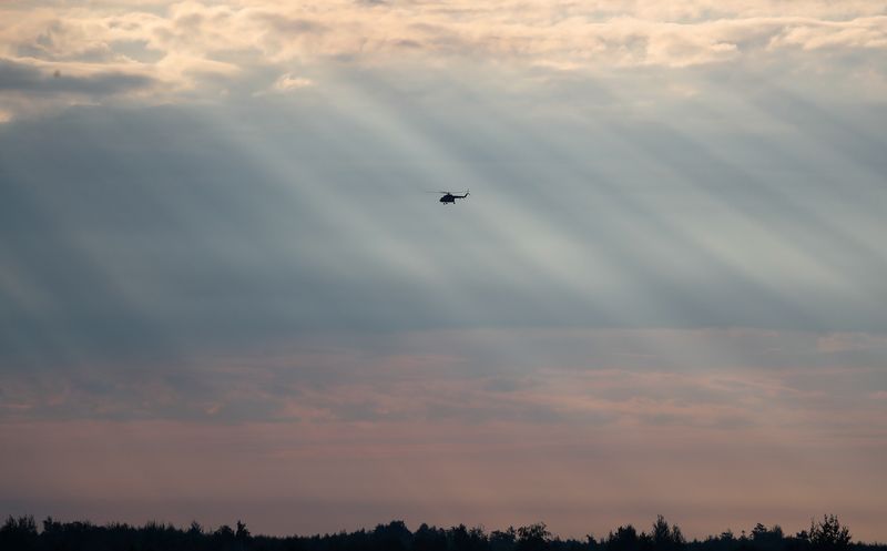 FILE PHOTO: Helicopter is seen in the sky during the