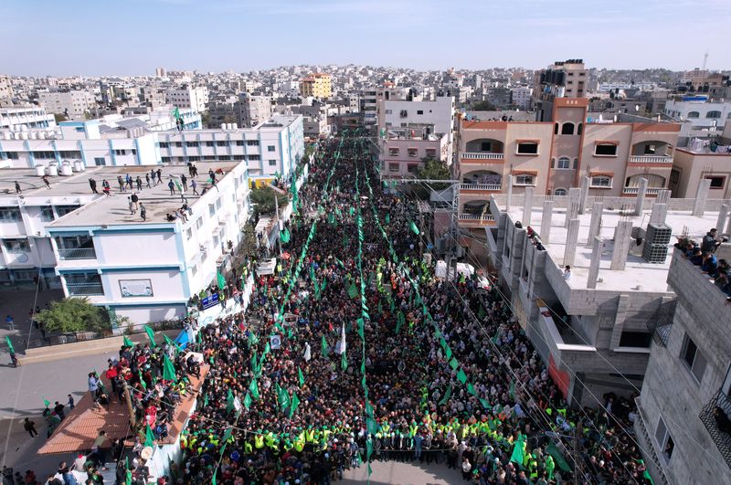 FILE PHOTO: Palestinians take part in a rally marking the