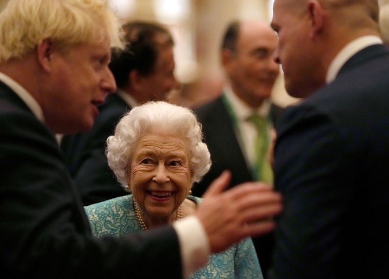 FILE PHOTO: Britain’s Queen Elizabeth and members of the Royal