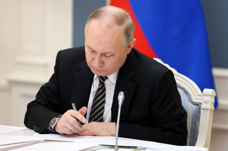 Russian President Putin attends the Supreme Eurasian Economic Council via
